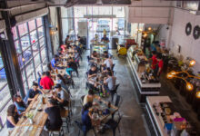 cafe interior with so many crowds enjoying their coffee