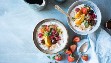 Two bowls of healthy food consisting of fibre fruits and carbs