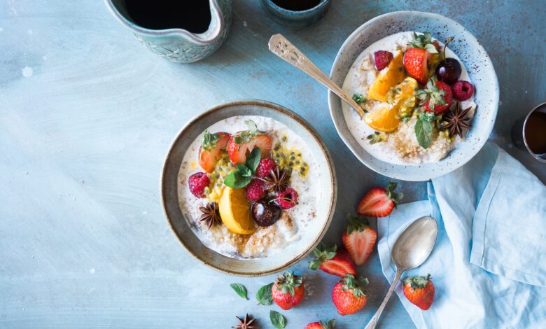 Two bowls of healthy food consisting of fibre fruits and carbs