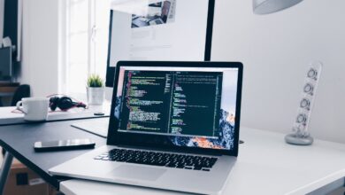 laptop screen with lines of coding of artificial intelligence